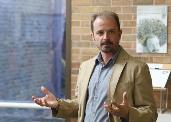 Photos by Scott Mitchell | Michael Hogue addresses the crowd at his Atrium Gallery reception April 28.