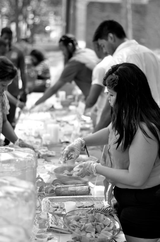 Brookhaven student Jessica Garcia prepares food for attendees at the event. 