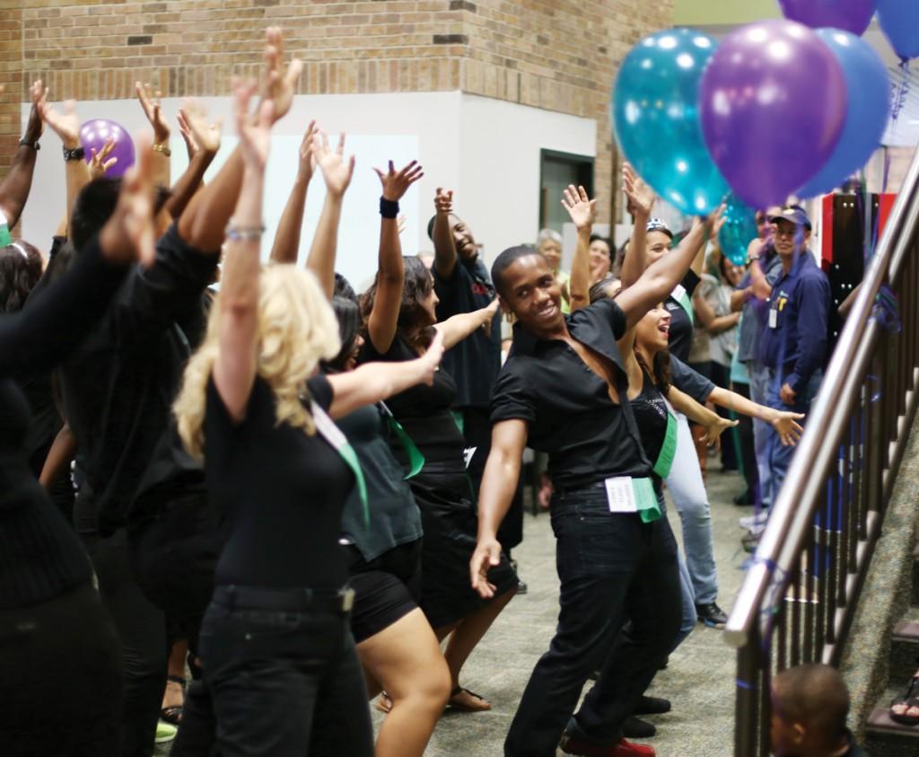 Photo by Scott Mitchell | A flash mob invaded the grand opening ceremony for the Employee Success Center Sept. 30.  