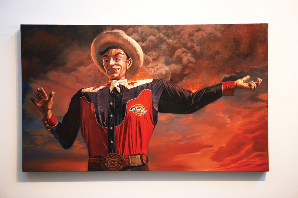 Photos by Scott Mitchell | Mark Ross’ oil-on-canvas painting, ‘Big Tex Burning,” hangs in the Atrium Gallery.