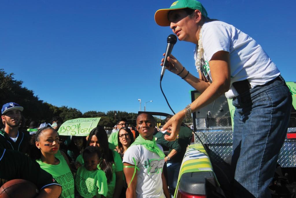 Photos by Cynthia Ochoa,  Jose Perez and Paul Lauder | Suzette Vaquera-Constantine readies the Brookhaven students before the parade. 