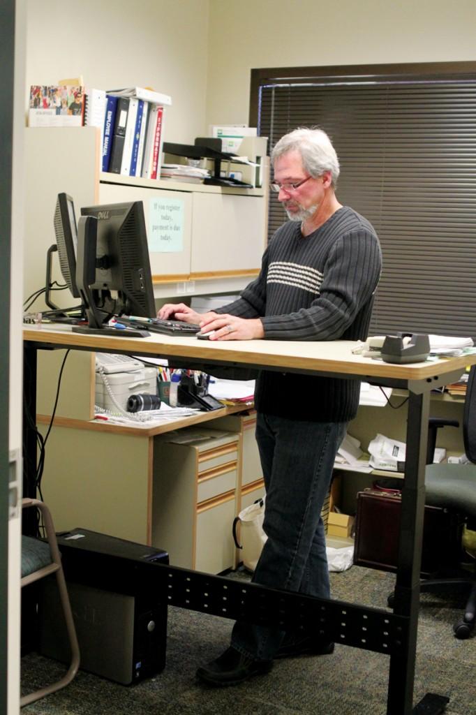 Photos by Brigitte Zumaya | Brookhaven adviser Brad Thomas checks a student's transcript.