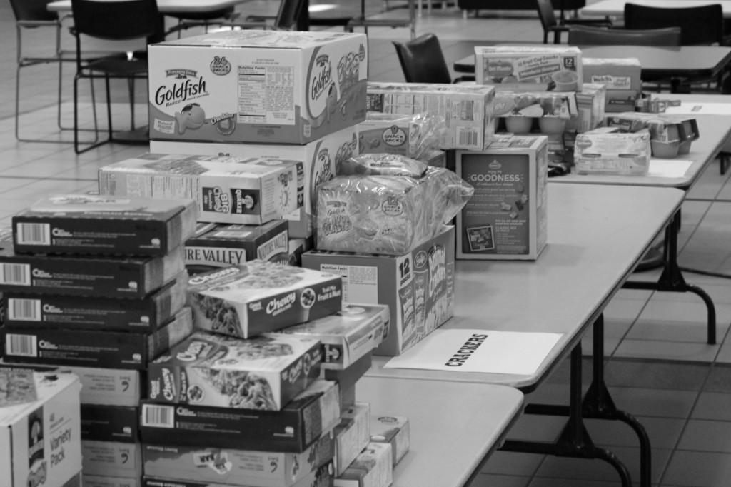 Photo by Ravin Lee | The tables, organized by type of snack, display over 2,500 donated  snacks.  
