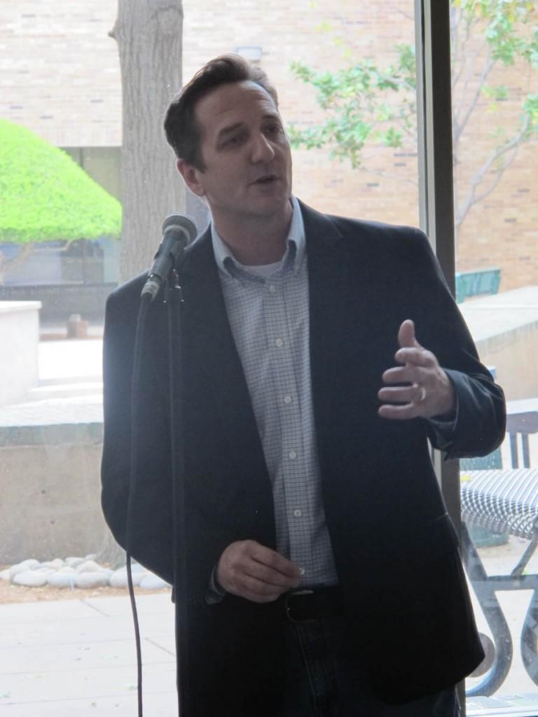 Photo by Nicholas Bostick | Jason Carney reciting a poem at Patrica Smith's reading April 14, in the Performance Hall. 