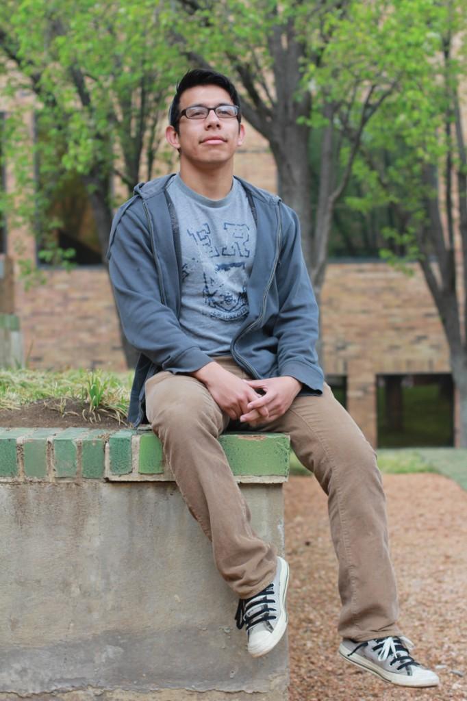 Photo by Maddox Price | Brookhaven student Victor Batres, who initiated the petition for a sustainability coordinator position, sits in front of some of the campus greenery. 