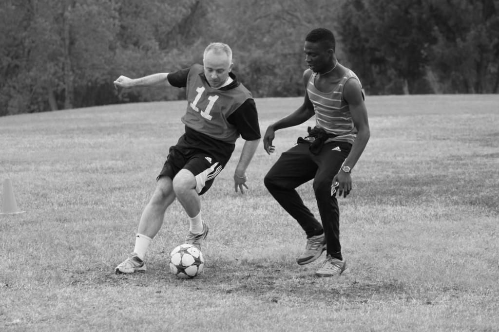 Photos by Brigitte Zumaya |Sandro Reis pretects the ball from Samual Ozazemen Omoregie 