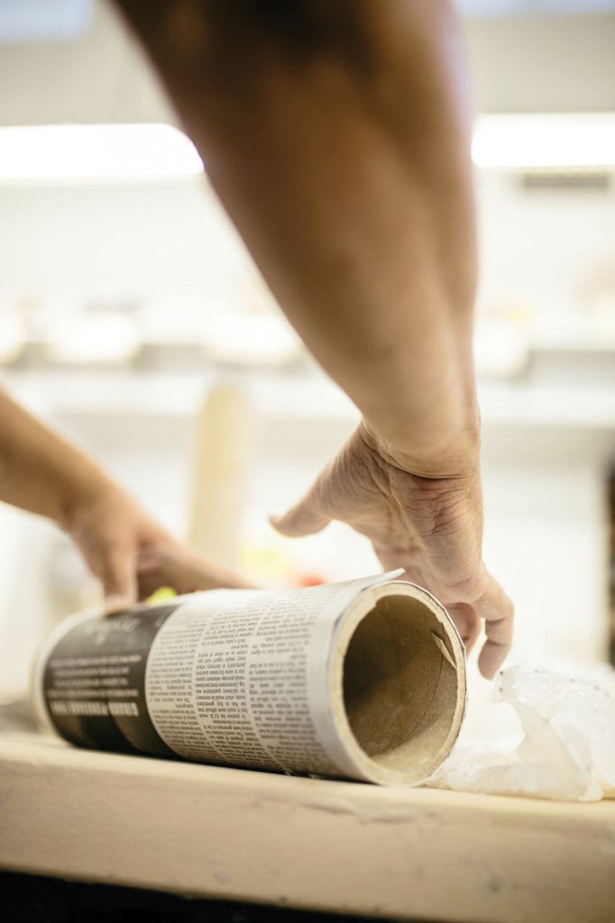 Photos by Kathy Tran A student prepares clay by rolling it flat with a tube