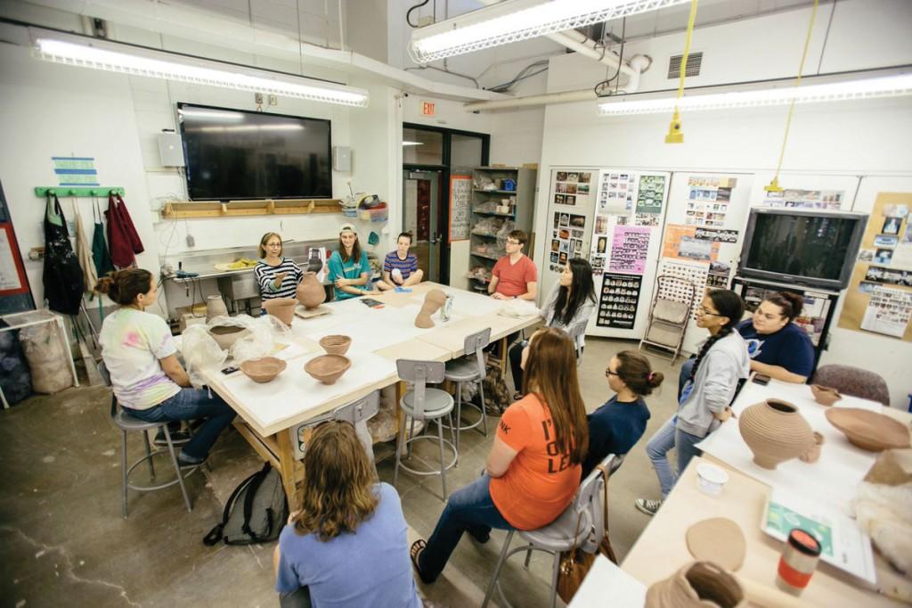 Photos by Kathy Tran | A Brookhaven ceramics class listens to a lecture before getting their hands dirty.