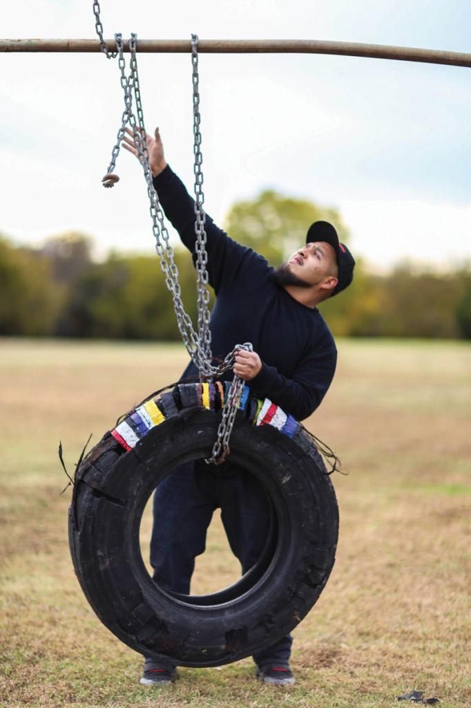 Photos by Kathy Tran | Gonzalez works with his installation “My Childhood Labor,” which was displayed spring 2013 at Brookhaven College as part of a sculpture class assignment to create a piece based on home. 