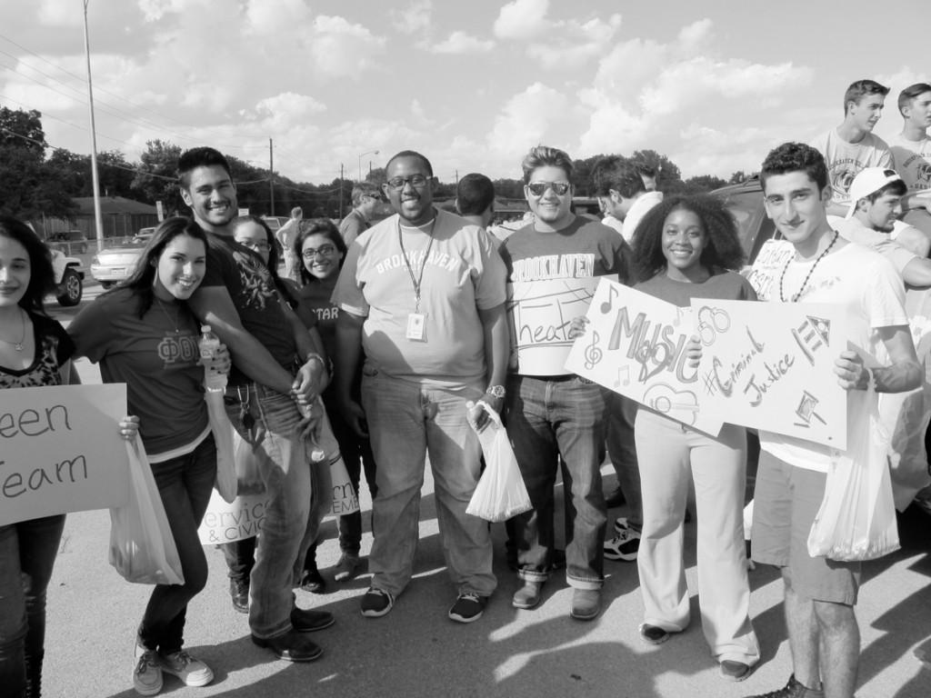 Photo by Jessica Ayers | Brookhaveans pose for a group photo during the homecoming parade while representing their respective majors.