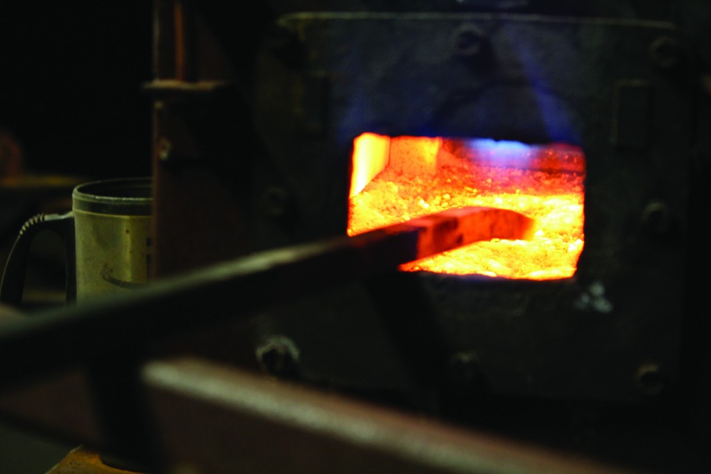 A propane forge heats metal to make it flexible.