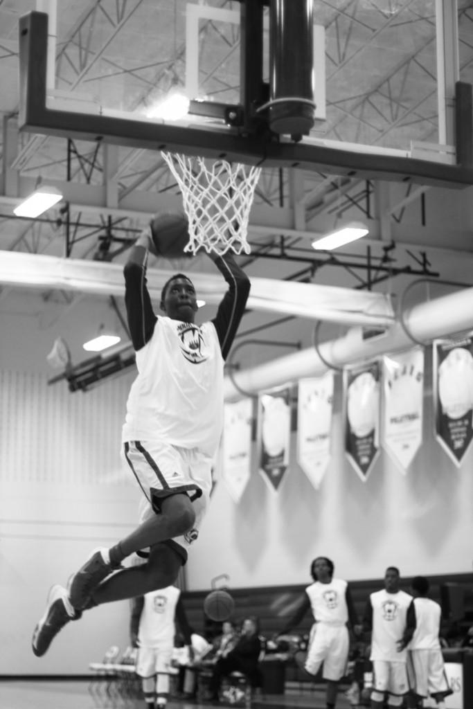 Photos by Brigitte Zumaya | Top Left: Aaron Okonfua, #34, makes a slam dunk for the Brookhaven basketball team.
