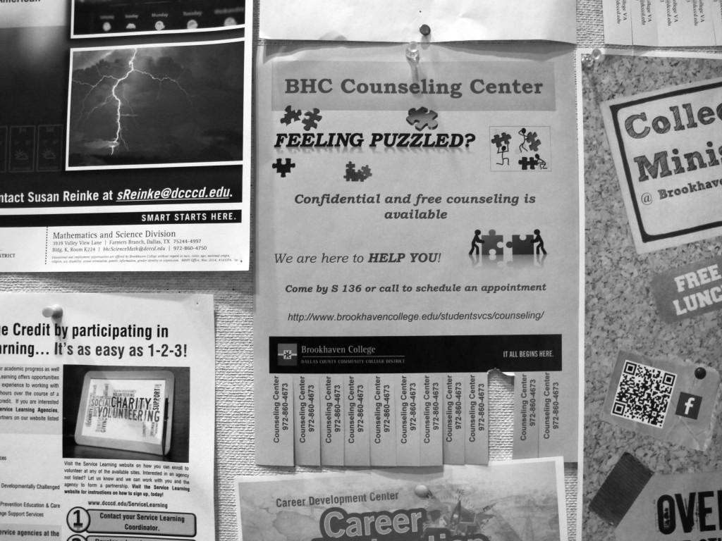 Photo by Nicholas Bostick | Flyers promoting the counseling center services are pinned on boards across campus.