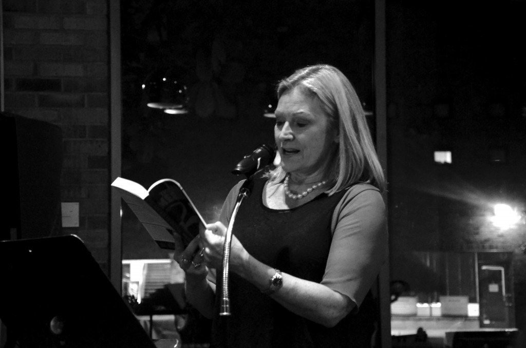 Photo by Travis Baugh | Carney’s publisher, Kaylie Jones, reads aloud from her latest book, “The Anger Meridian.”