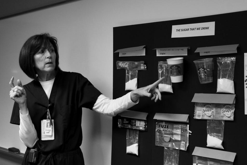  Photos by Claudia Valerio | Courier  Brookhaven College Nurse Mildred Kelley talks about “the sugar that we drink.” 