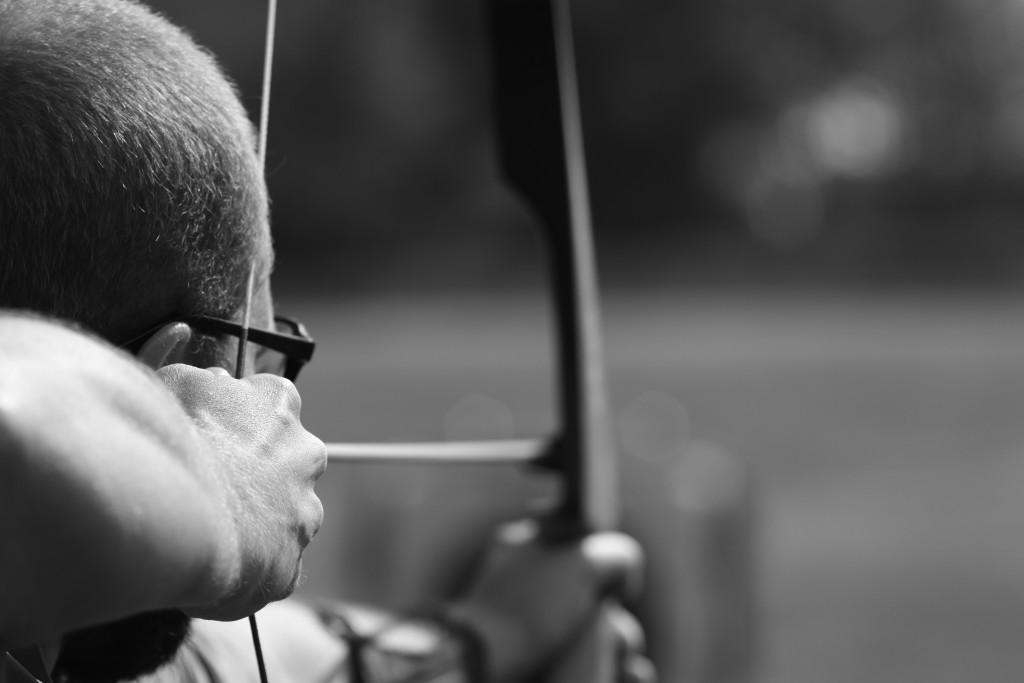 Student Parker Donald focuses and aims at the target. 