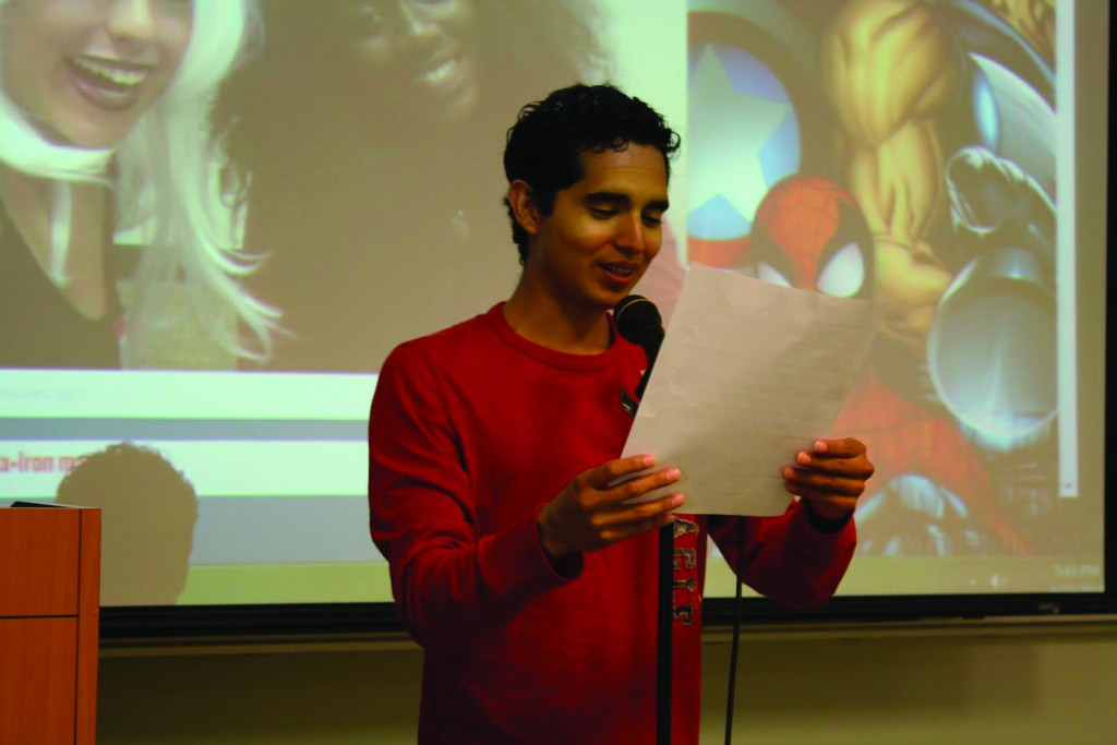 Student Jamie Goicoechn reads aloud an original story created from comic prompts provided to attendees.