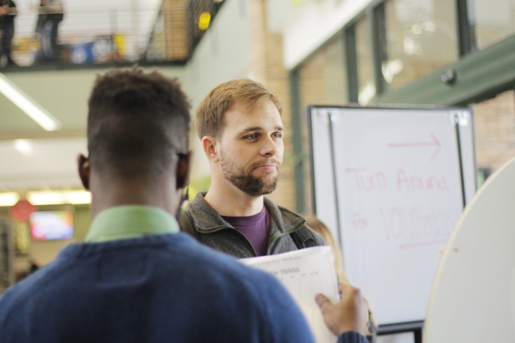 Photo by Ravin Ren | Aaron Pape, a student, answers trivia questions at Brookhaven College's Black History Month Trivia Event Feb. 9 in S Building lobby. 