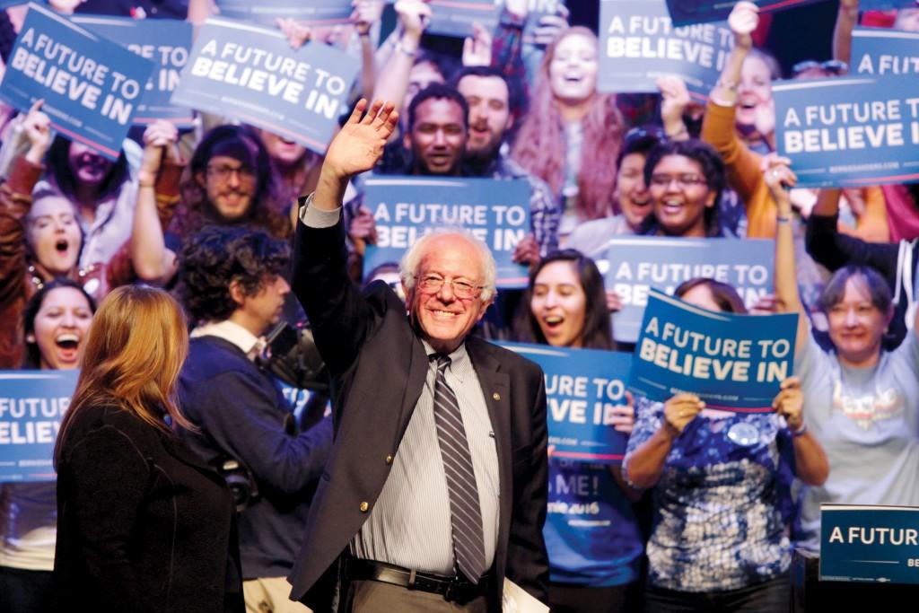 Photo by Ravin René |Bernie Sanders, Vermont senator and Democratic presidential candidate, waves at a supportive crowd of more than 7,000, Feb. 27, at the Verizon Theatre in Grand Prairie. 