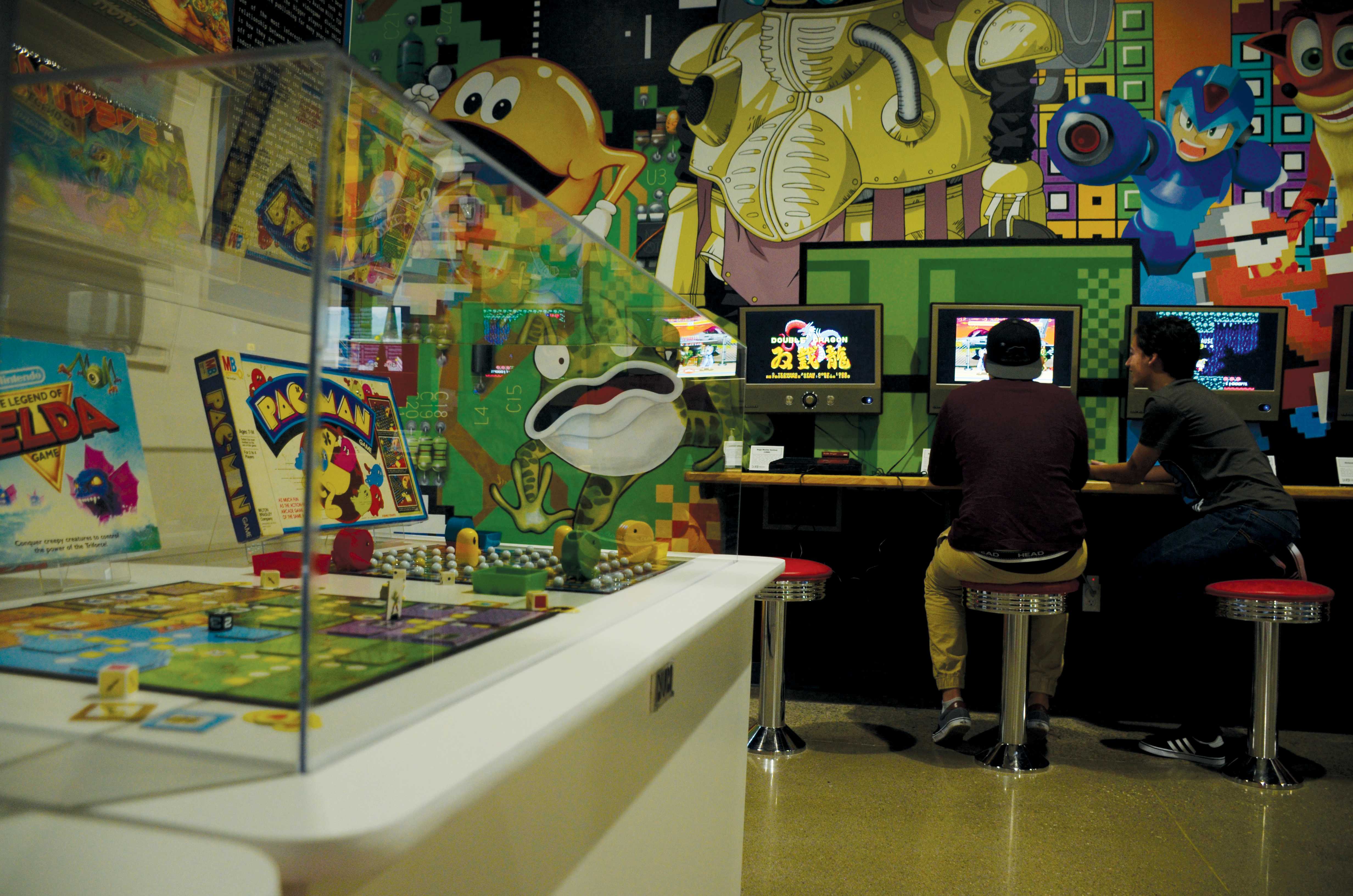 Photos by Jacqueline Arredondo | A Pac-Man board game is displayed in the Unplugged exhibit in the National Videogame Museum in Frisco, Texas.