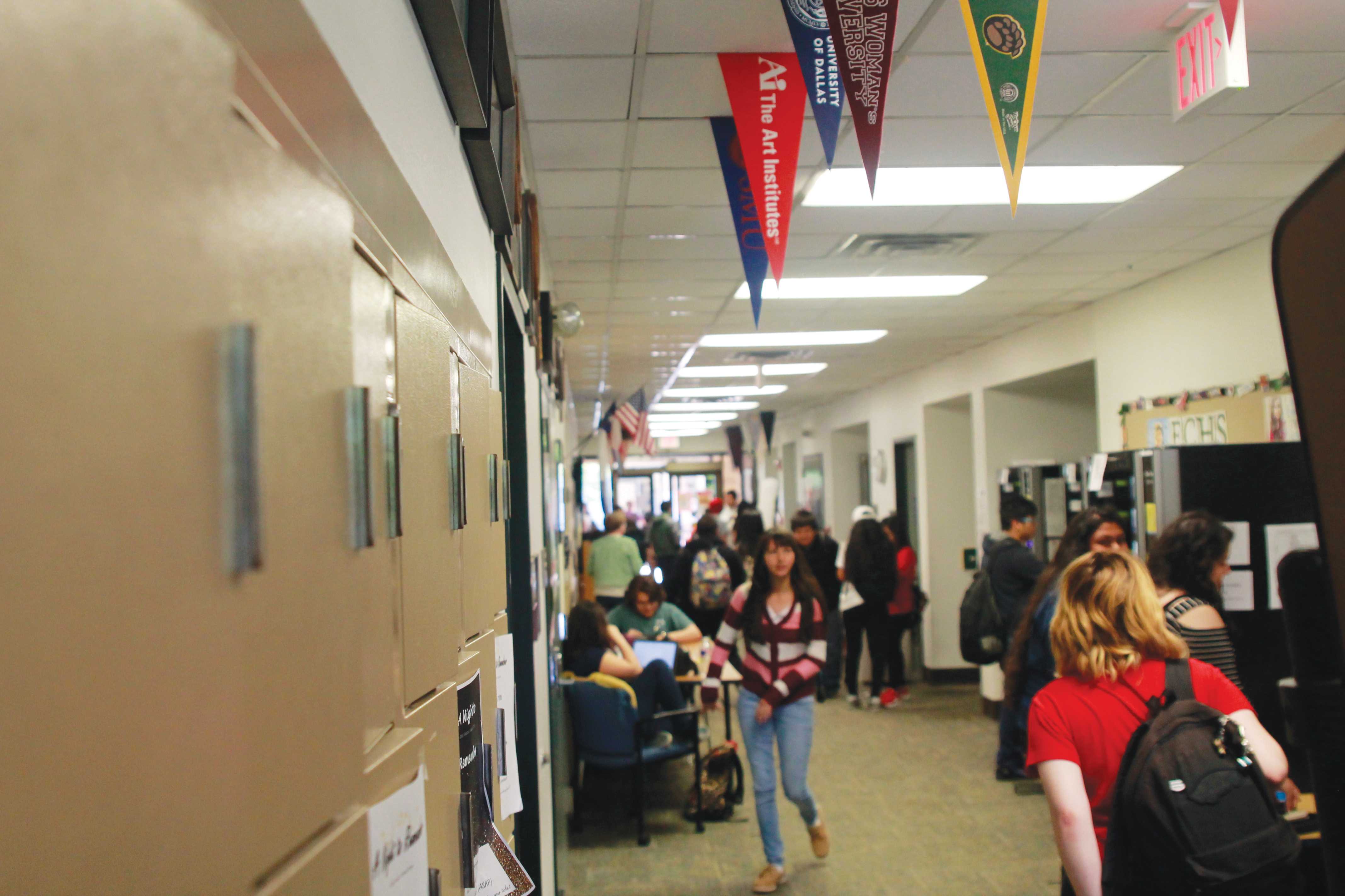 Photo by Ravin René | Students gather in the hallway of Brookhaven College’s Early College High School have the opportunity to earn an associate degree, as will students in the district’s new academies. 