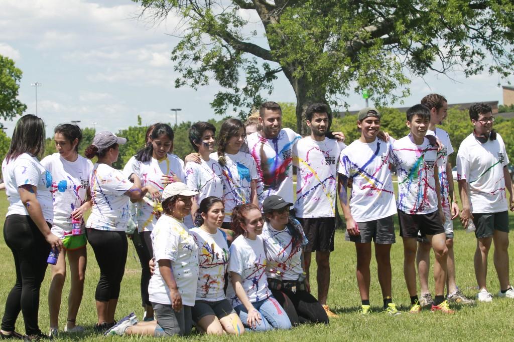 Photo by Ravin René | Participants of the Color Run 2016 pose for a post-event group photo April 22. The event had a large turnout from internationals students.