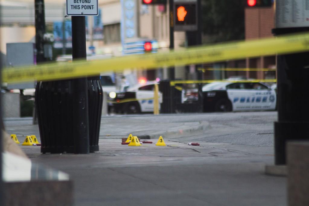 Photo by Michael Dunlap The Dallas Police Department set cones to mark the evidence of the crime that took place July 7.