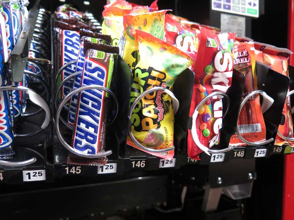 Photo by Diamond Victoria Vending machines carrying Snickers, Sour Patch Kids, Skittles and other snacks fill the halls of Brookhaven College. 