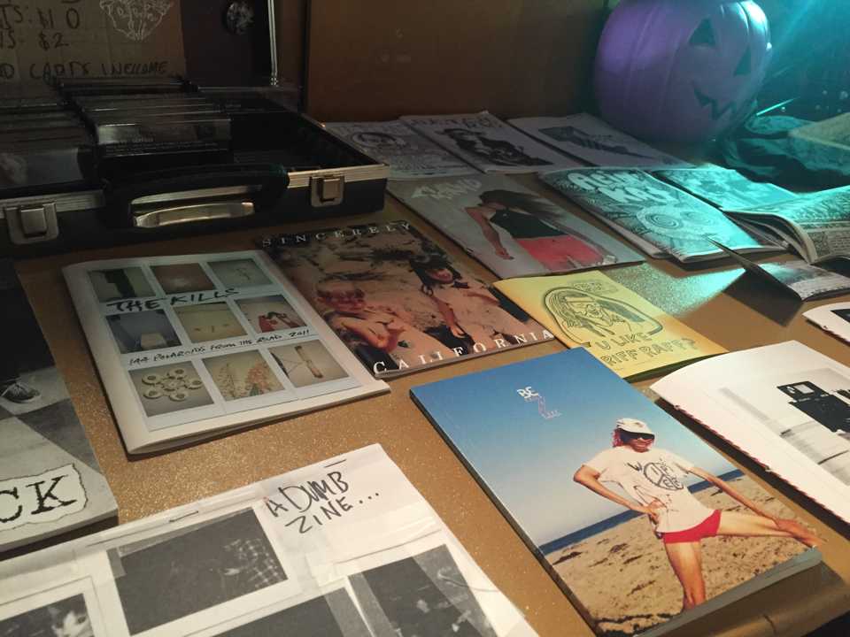 Photo by Jubenal Aguilar Several DIY zines line the tables at the Zine Swap. 