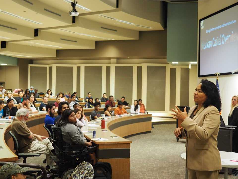 Photo by Jubenal Aguilar Angelica Gurrola, a Drug Enforcement Administration special agent, talks to students, staff and faculty about local drug rings that use the homeless  to obtain prescription medications with the aid of accomplice doctors.