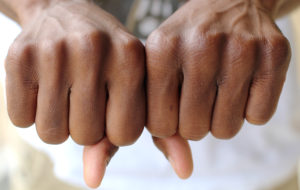 Photo illustration by Sam Mott | Bare-knuckled combat may be safer than boxing with gloves.