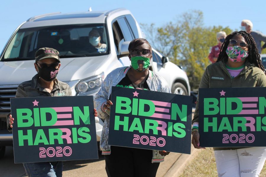 Biden and Harris fans show their support with signs during Democratic vice presidential nominee Kamala Harris Oct. 30 campaign stop in Fort Worth. 