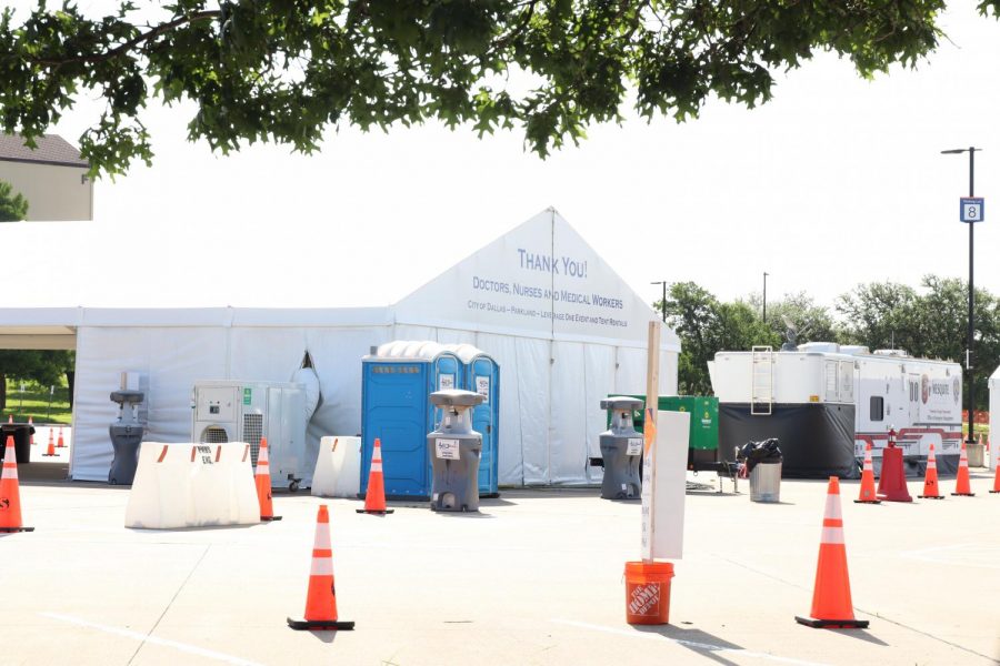 Parkland Memorial Hospital staff await patrons at the Dallas College Eastfield Campus drive-through vaccination clinic on May 29. The drive-through vaccination clinic closed May 29 and relocated to the main hospital at 5200 Harry Hines Blvd. 