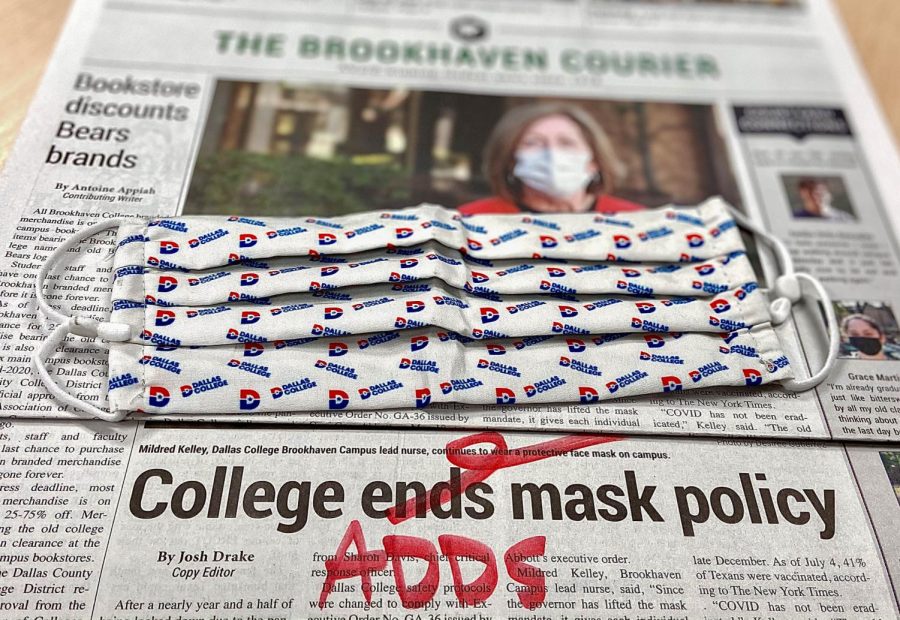 photo of newspaper with mask and edited word adds to mask policy headline
