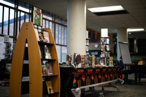 The Learning Commons displays books celebrating Black History Month across the front desk in L Building.