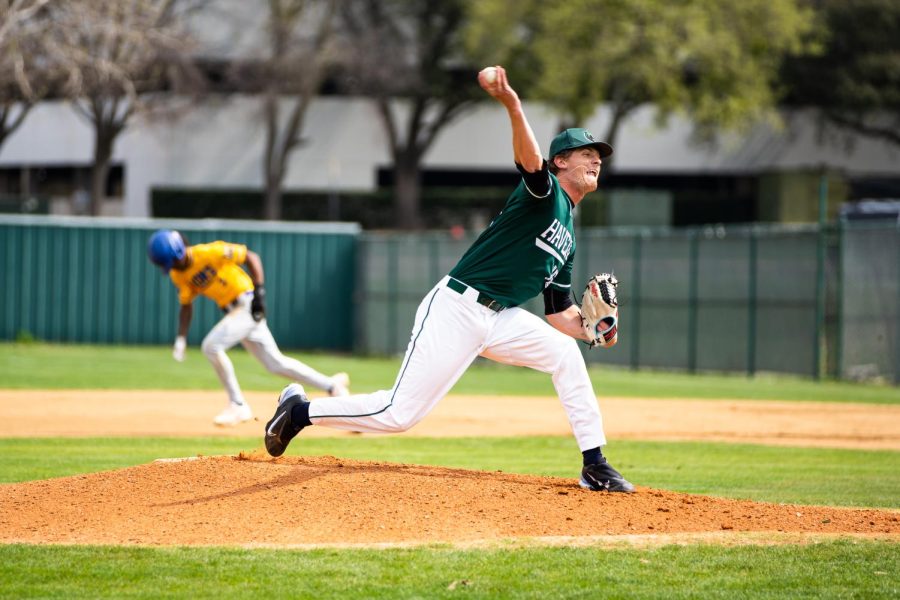 BHC+Bears+pitcher+Tommy+Giese+hurls+a+pitch+while+MVC+Lions+second+baseman+Archie+Beasley+tries+to+steal+second+base+at+BHC+on+March+8.