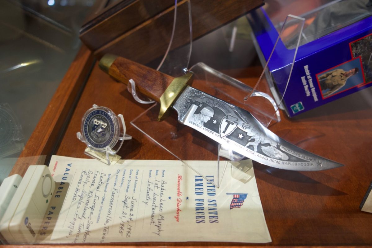 A knife with engravings on display.