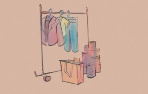 Illustration of clothes hanging on a rack.