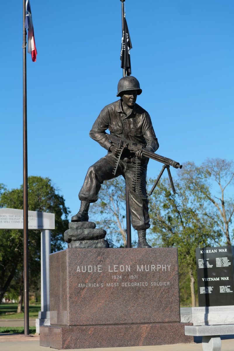 A memorial statue stands at the Audie Murphy American Cotton Museum.