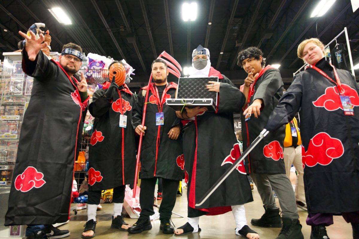 A group of men in costumes.