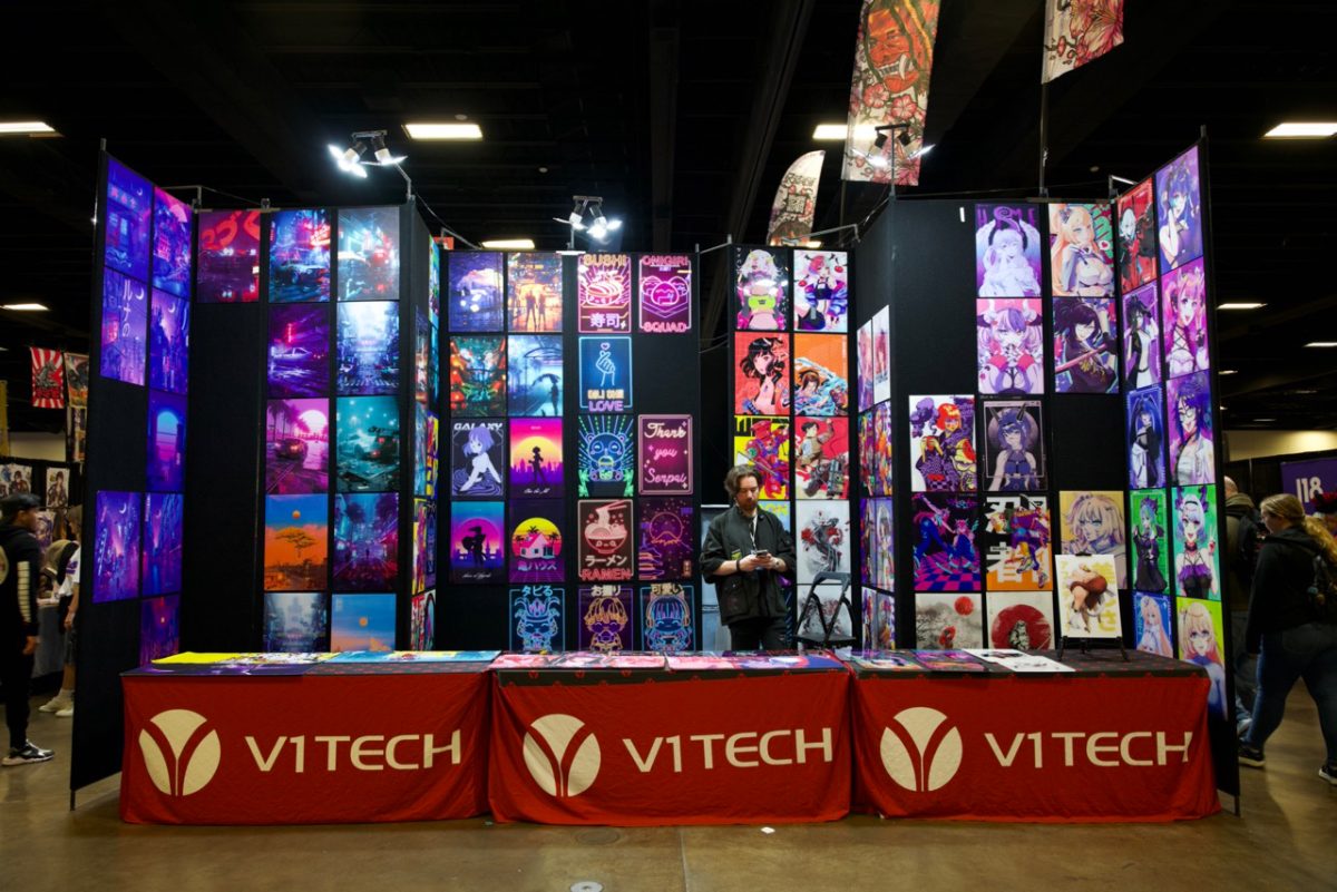 A booth filled with posters.