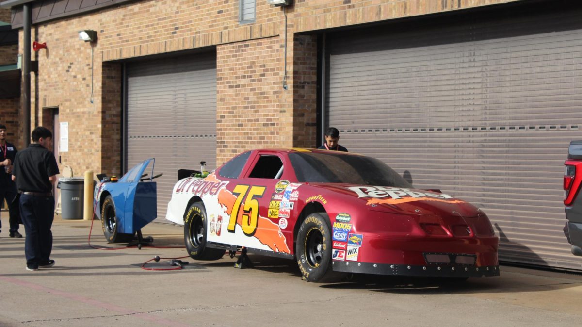 Dallas College automotive students attend the Ford auto expo on March 25 at Brookhaven. At the expo, students visited different booths, in which they had the opportunity to talk to different car dealerships, such as Ford and Mercedes, as well as view cars from racing companies.
