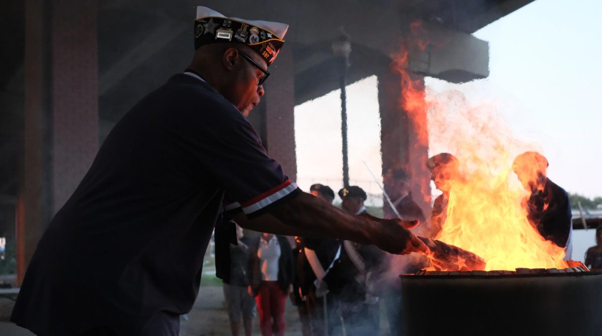 Darrell Hartley burns a worn American flag to retire it. 