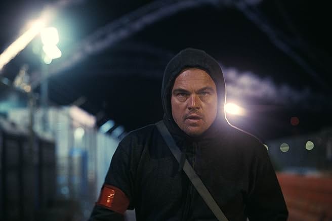 Pat Calhoun (Leonardo DiCaprio) runs from an immigration detention center after completing his mission in Wes Anderson's "One Battle After Another."
Photo Courtesy Warner Bros. Pictures - © Warner Bros. Pictures