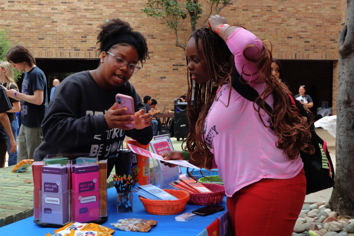 Tiara Confidente talks about Talk About It Texas with Paula Obele, a nursing student.